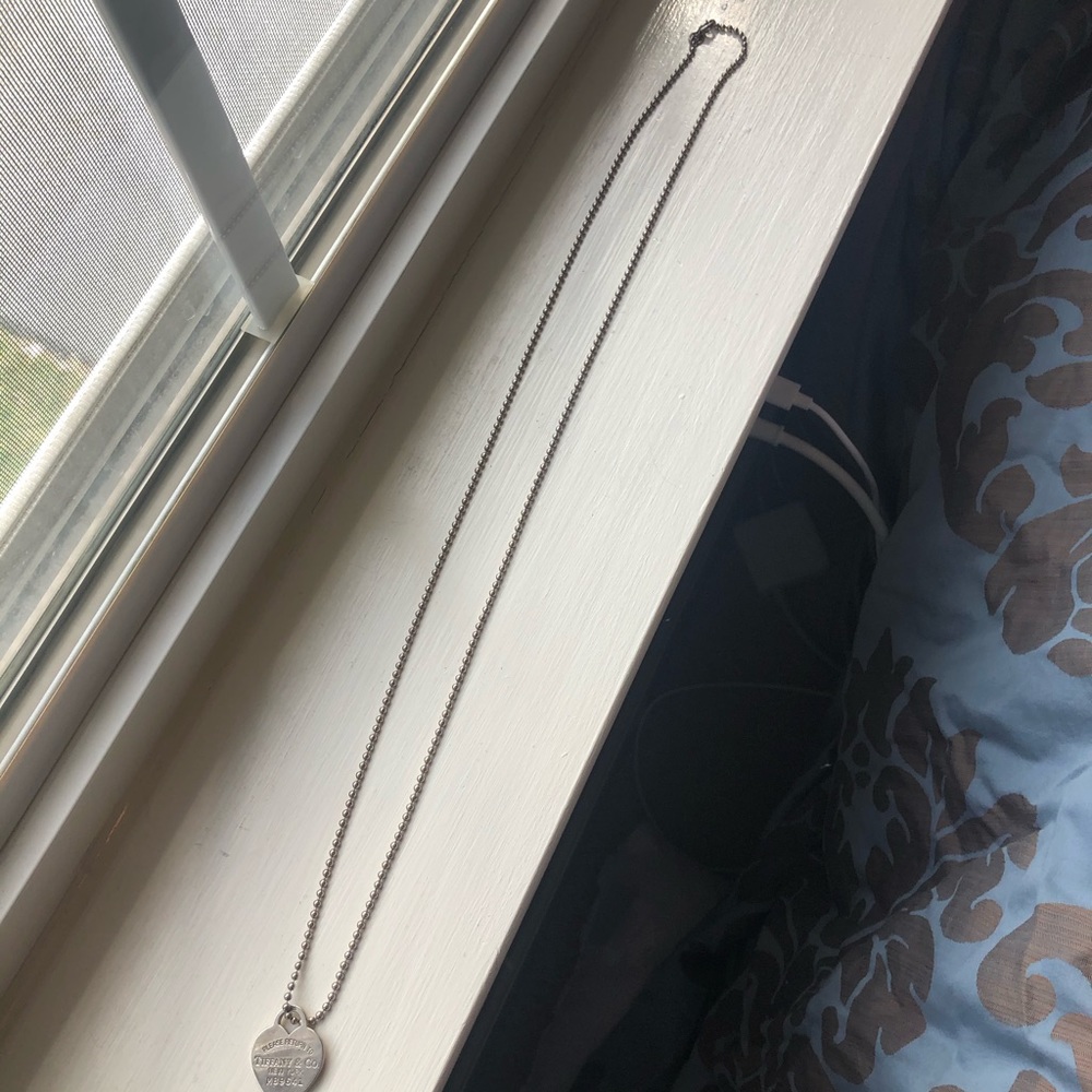 Tiffany’s long chain silver necklace